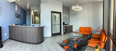 Reception and waiting area at 32 Dental Urgent Care, with comfortable seating and a calm, welcoming layout